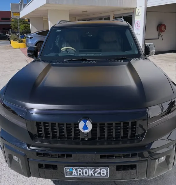 Black 4WD ute front end