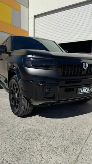 Black ute with chrome delete and dark tint