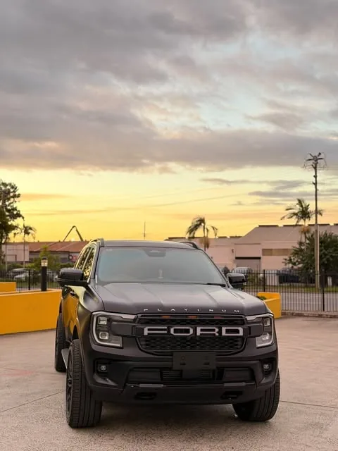 Blacked-out Ford Ranger at sunset after a Hustlers build